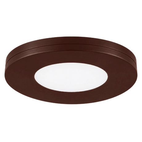 Bronze slim puck under cabinet lighting providing warm and functional illumination
