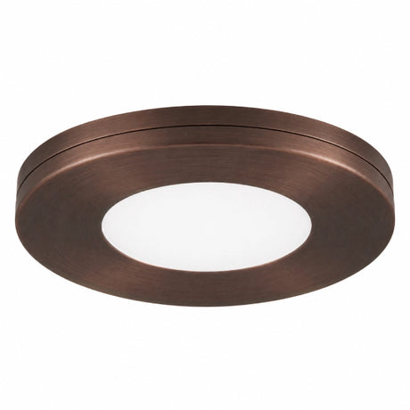 Copper slim under cabinet puck light offering decorative and practical illumination