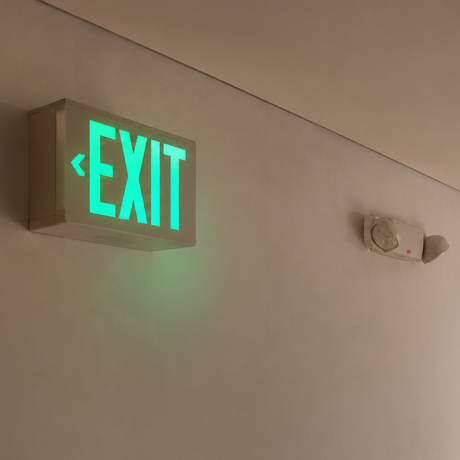 Emergency exit sign with square design and battery backup for safety compliance